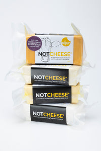 Onion & Chive Cheddar — vegan onion and chive cheddar-style cheese by Let Them Eat Vegan, front of pack