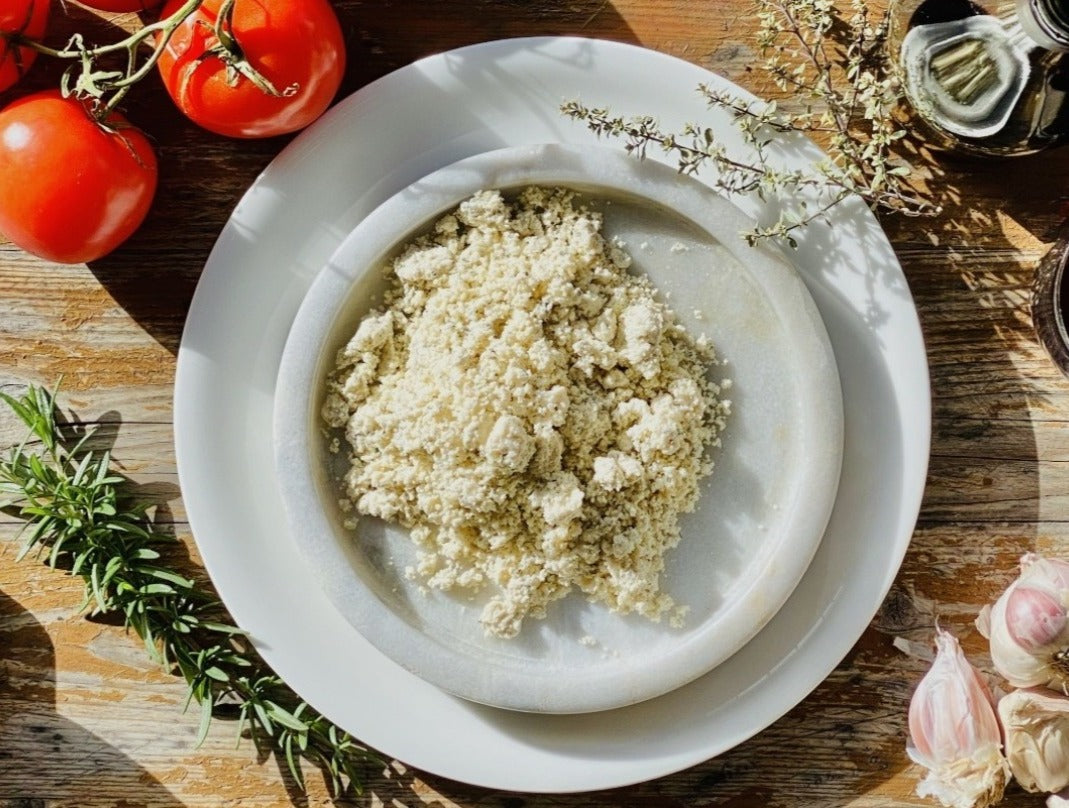 Herbed Feta Crumbles — vegan herbed feta-style crumbles by Let Them Eat Vegan, front of pack