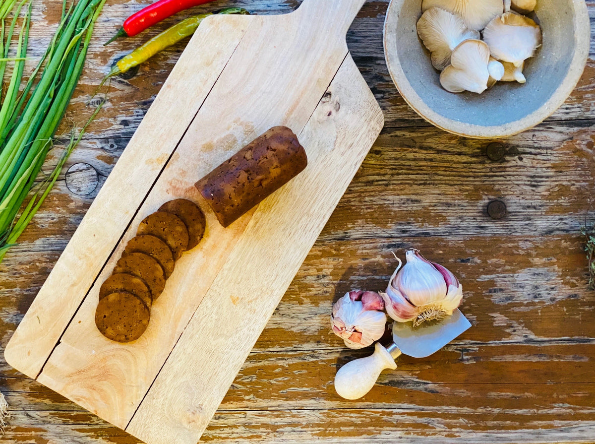 Not Salami — vegan salami-style roll with pepper, additional shot