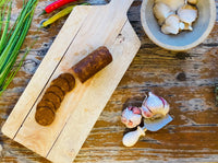 Not Salami — vegan salami-style roll with pepper, additional shot